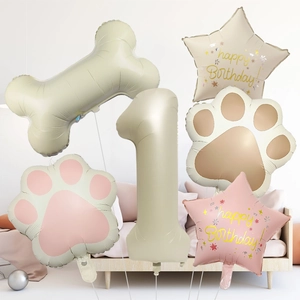 Dog bone balloon set with number one for first birthday party decoration in cream tones