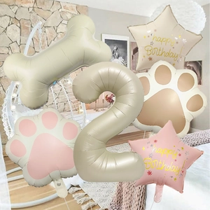 Detailed group shot of bone-shaped foil balloons and cream number two birthday balloon set
