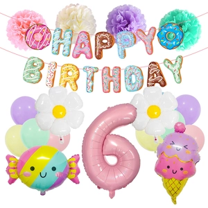 Dettaglio set decorazioni 6 anni con palloncini macaron e striscione donut gelato