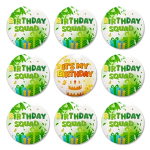 Set of 9 colorful birthday tinplate badges with cake and gift box patterns on white background