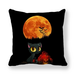 Detail of Halloween cat pillow case featuring black cat and bats against a full moon
