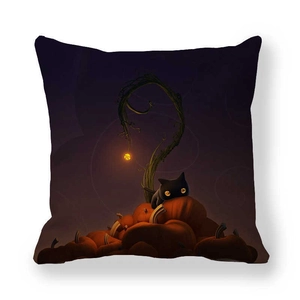 Detail of Halloween black cat and pumpkin digital print on a decorative pillowcase