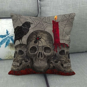 Halloween skull and crow linen pillow cover on a modern sofa for seasonal decor