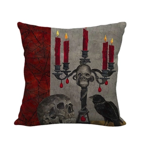 Linen skull throw pillow cover with raven and gothic candle stand for Halloween decor