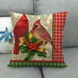 Christmas cardinal bird linen throw pillow cover with festive holly and berry print