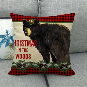 Christmas bear linen pillow cover with buffalo plaid trim and woods forest theme