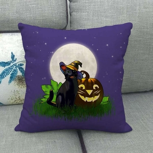 Close-up of Halloween linen pillowcase featuring a black cat, pumpkin, and starry night sky