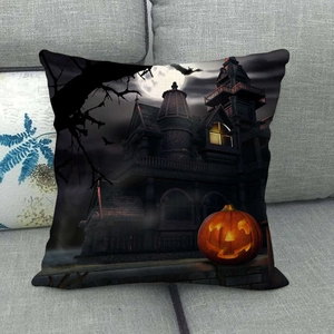 Halloween decorative pillow cover with haunted house and pumpkin on grey sofa