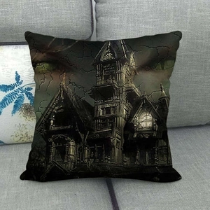 Gothic castle linen pillow cover with haunted house print on grey fabric sofa