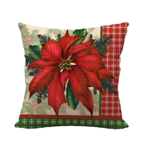 Christmas cardinal linen pillow cover featuring red poinsettia and green pine branches