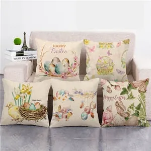 Detail showing five Happy Easter linen pillow covers with colorful egg and chick prints