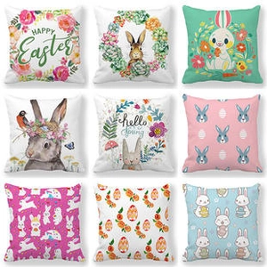 Set of nine linen Easter pillow covers with bunny and floral patterns on white background