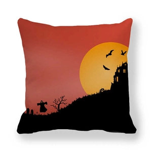Detail of Halloween pillow case featuring a gothic castle and pumpkin motifs