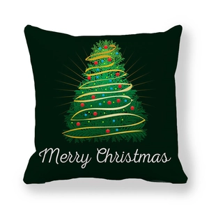 Detail of Christmas tree pillow cover with Merry Christmas text on green peach skin fabric