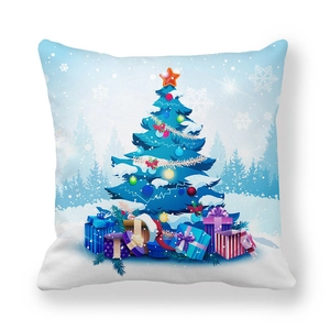 Close-up of a blue Christmas tree and gift box pattern on a soft peach skin pillowcase
