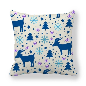 Detailed close-up of Christmas reindeer and snowflake patterns on soft peach skin pillowcase