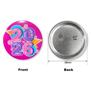Front and back detail of a 58mm tinplate badge for 2026 New Year celebration events