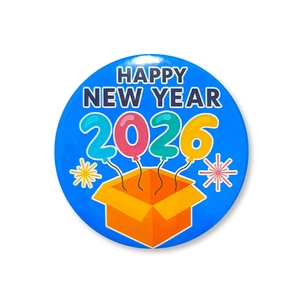 Detail of a 2026 Happy New Year tinplate badge with balloons and fireworks on blue background