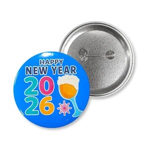 Front and back detail of 2026 Happy New Year tinplate badge with safety pin fastener