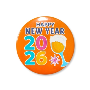 Detail of 2026 Happy New Year badge with orange background and beer glass icon