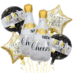 Detail view of Happy New Year foil balloon set with champagne bottles and golden stars