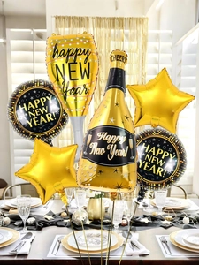 Detailed arrangement of New Year aluminum foil balloons with champagne bottle and stars