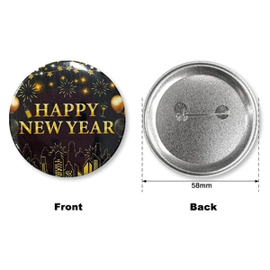 Front and back detail of a 58mm Black Gold Happy New Year tinplate badge with pin