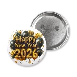 Front and back detail of a black and gold 2026 Happy New Year tinplate badge with pin