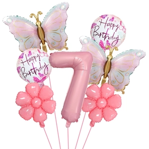 Detailed set of pink butterfly and number 7 foil balloons for birthday party decoration