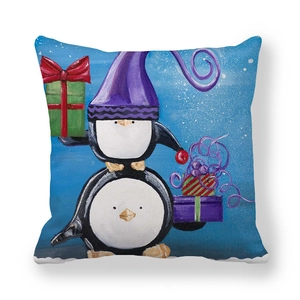 Detail of Christmas peach skin cushion cover with cute penguin illustration on blue background