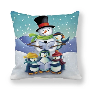 Detailed view of peach skin pillowcase featuring festive singing penguins and a snowman