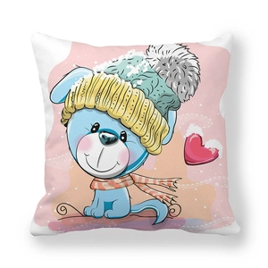 Housse de coussin de Noël avec un chiot de dessin animé portant une écharpe et un bonnet