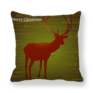Christmas reindeer pillow cover in dark green peach skin fabric with festive typography