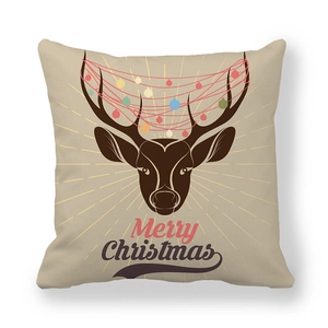 Close-up of reindeer head pillowcase with Merry Christmas text on peach skin fabric