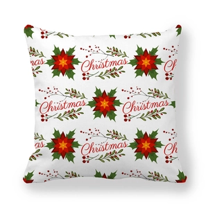Macro shot of peach skin fabric texture with red poinsettia and Christmas print