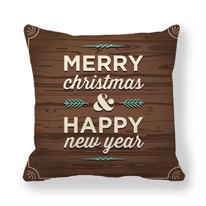 Detail of Christmas pillowcase featuring dark brown wood grain print and festive text