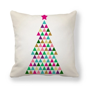 Detail of colorful geometric Christmas tree print on cream peach skin pillowcase