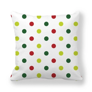 Detail of Christmas peach skin pillowcase featuring festive red and green polka dots