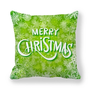 Green Christmas pillow case with white snowflake patterns and Merry Christmas text