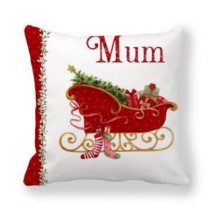 Detail of Christmas pillowcase featuring red sleigh and festive Mum lettering on white fabric