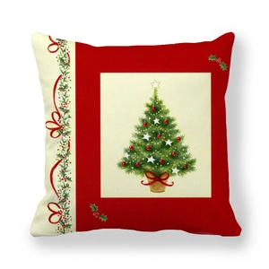 Detail of red and beige Christmas tree pillowcase with festive holly ribbon decoration