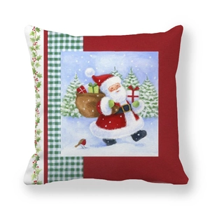 Detailed close-up of a festive Christmas pillow cover with Santa Claus and holly patterns