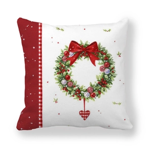 Detailed view of festive Christmas wreath pattern on a soft peach skin throw pillow cover