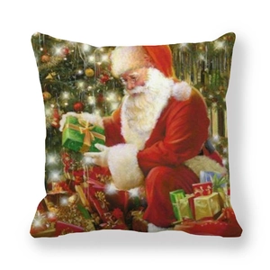 Detail of Christmas pillowcase showing hand-drawn Santa Claus with a festive gift and tree