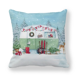 Détail de la housse de coussin de Noël avec camping-car vintage et décor aquarelle