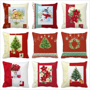 Collection of nine Christmas themed pillow covers with cartoon reindeer and snowman designs
