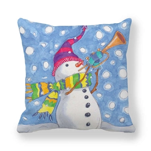 Close-up of peach skin fabric cushion cover with watercolor snowman playing a golden trumpet
