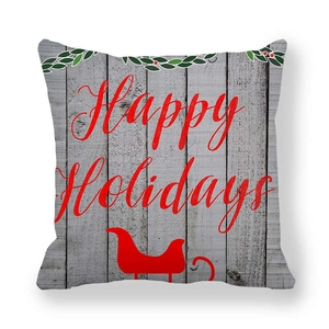 Λεπτομέρεια μαξιλαροθήκης Happy Holidays με κόκκινο έλκηθρο και υφή ξύλου
