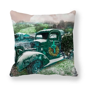 Close-up of vintage Christmas truck pattern on soft peach skin fabric cushion cover