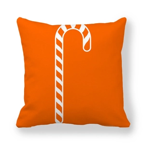 Detail of orange Christmas pillowcase with white candy cane print on peach skin fabric